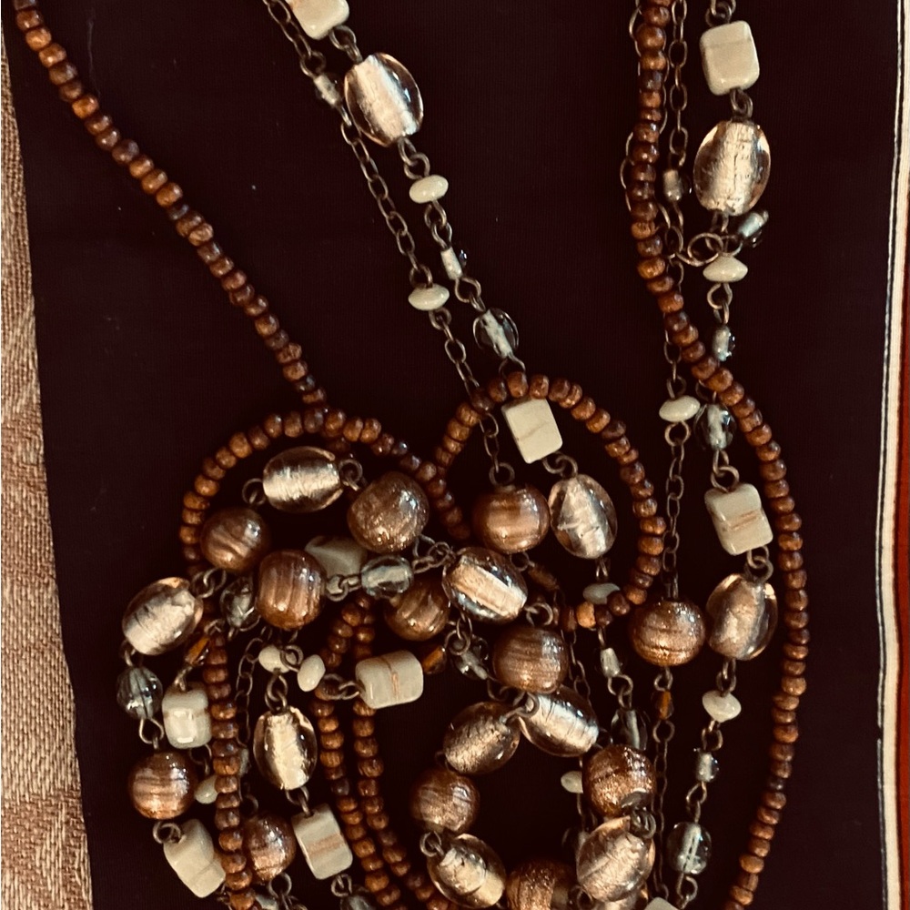 SALE!Vintage necklace with a variety of lovely glass beads in Brown and Cream.